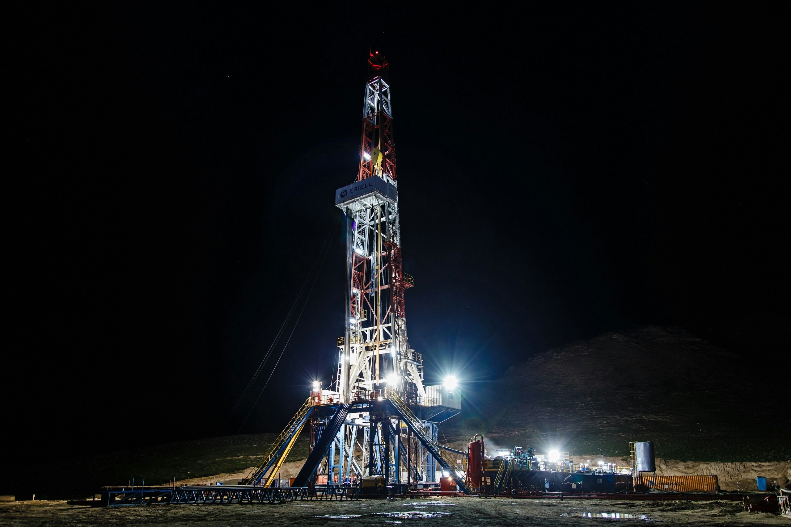 Drilling rig tower against the sky
